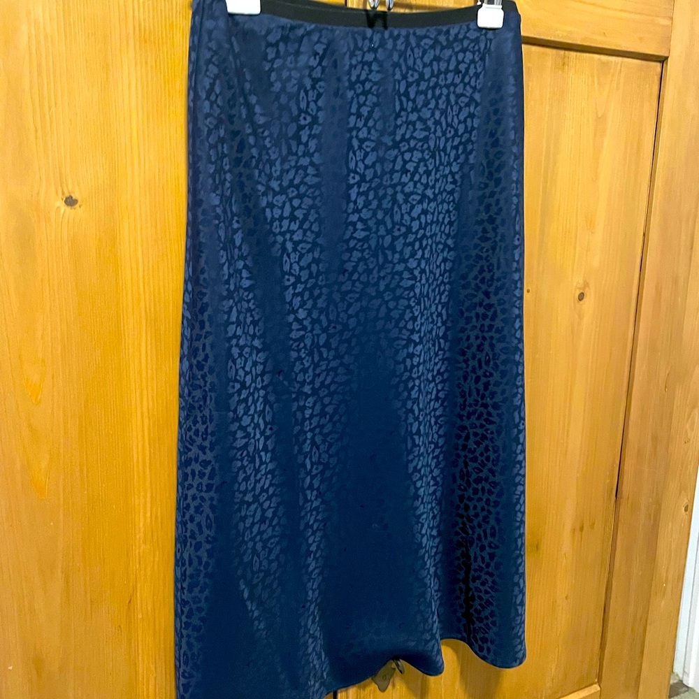 Sleek silk like skirt with subtle animal print